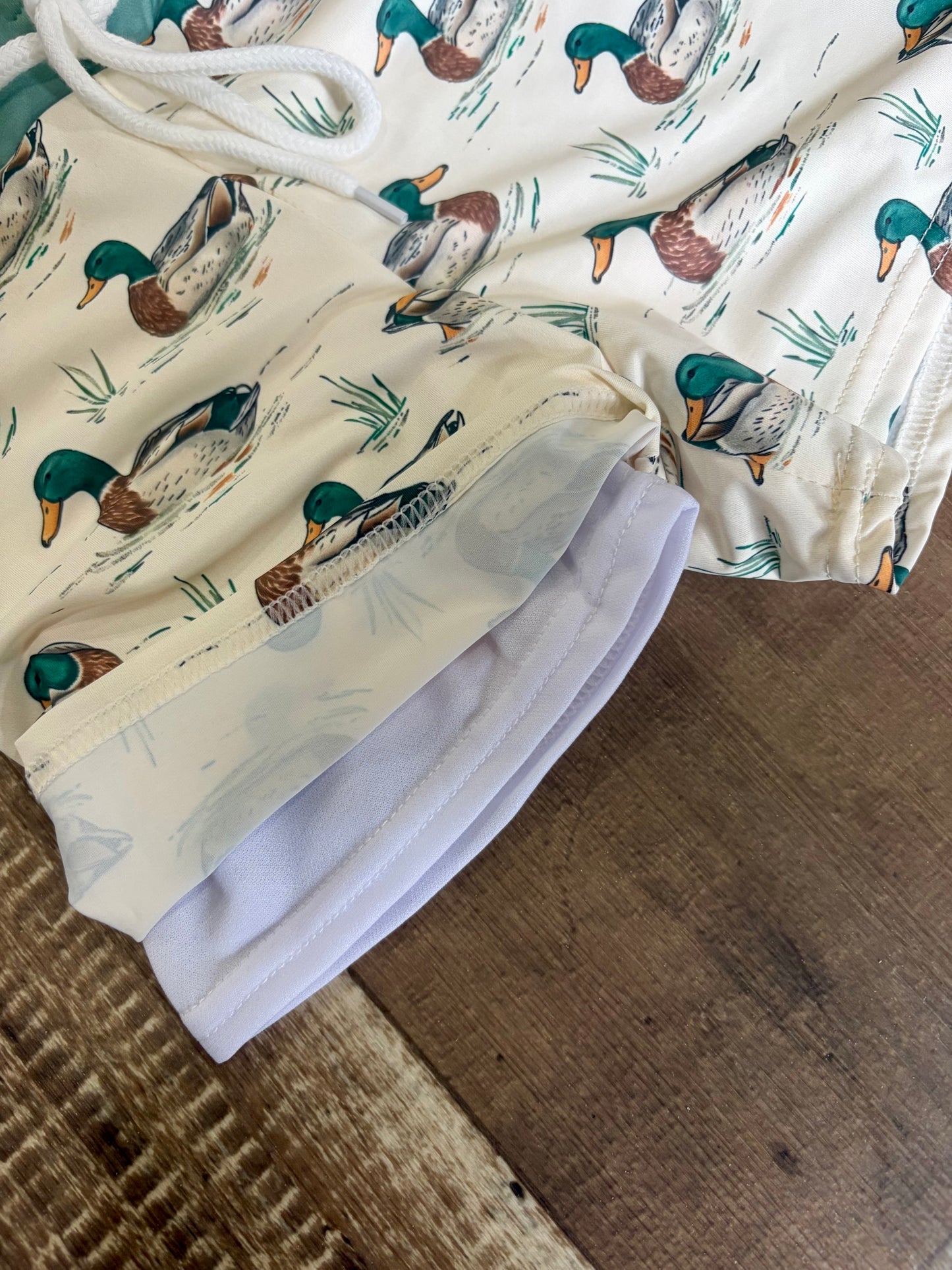 Quack Quack Swim Trunks
